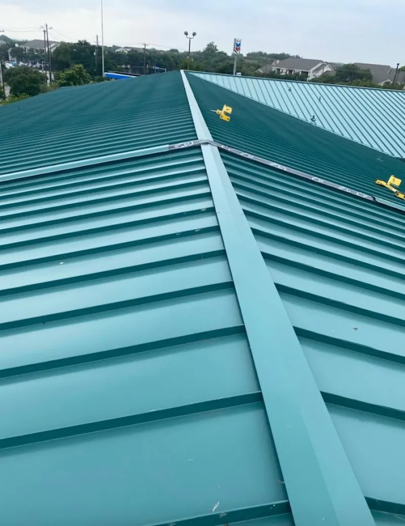 Green commercial metal roof ridge and valley for Metal Roof Repair in Clemson University